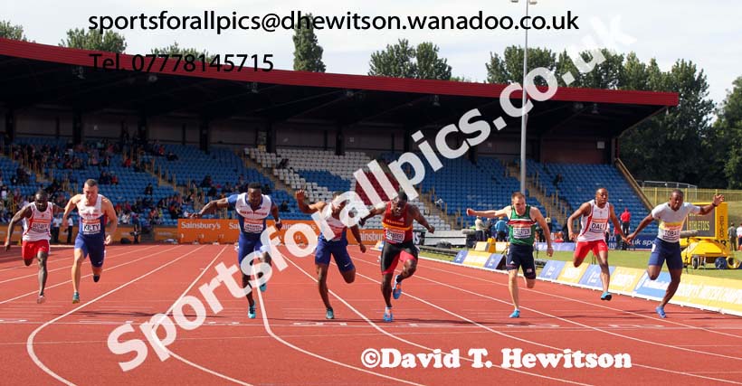 Dwain Chambers (Belgrave) wins from Harry Aikines Aryeetey (Sutton) and Chijindu Ujah (Enfield) 3rd, 100 metres, 2014 Sainsbury's British Championships. Photo: David T. Hewitson/Sports for All Pics